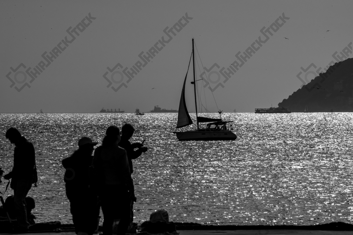 Sun reflections and sailboats