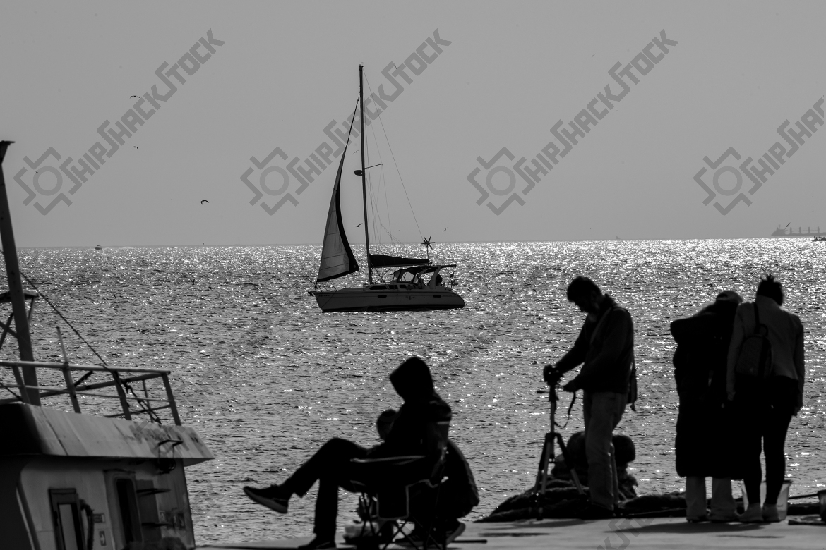 Sun reflections and sailboats